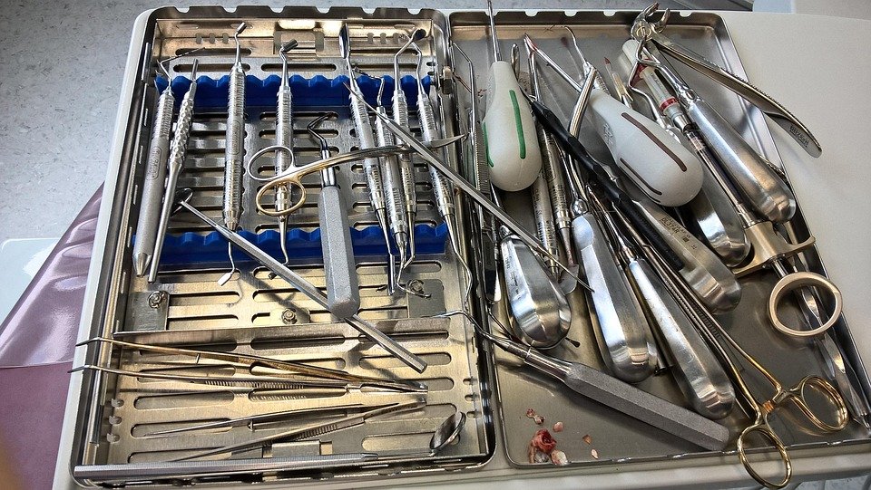 How do bad habits like nail-biting affect oral hygiene?