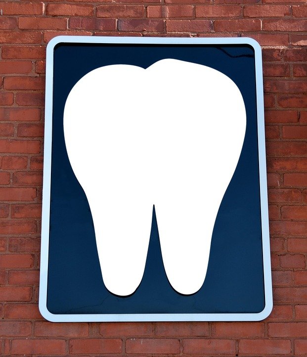 What types of facial asymmetry are most noticeable and distracting in a smile?