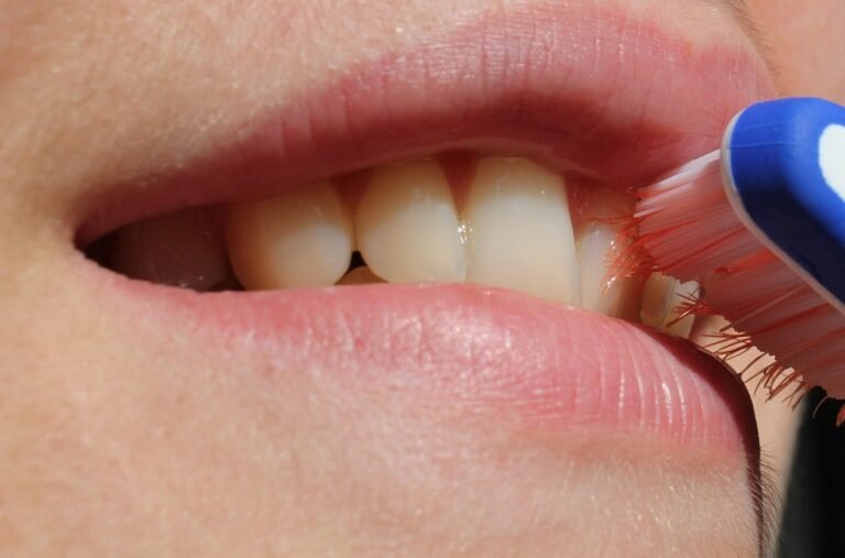 Does lighting impact how teeth appear in photos