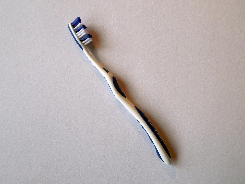 What are the key elements of a comprehensive dental exam