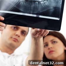 A dental model and tools illustrating the concept of dry socket after tooth extraction