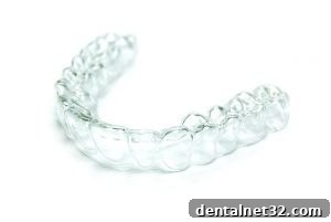 A woman with a beautiful, straight smile after Invisalign treatment in Holly Springs