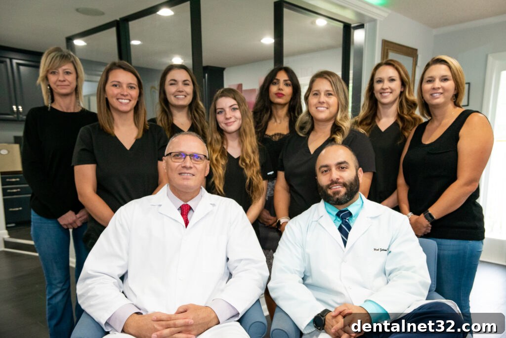 Fortify Your Teeth Against Decay 3 A friendly dentist in Locust, NC, consulting with a patient about cavity treatment