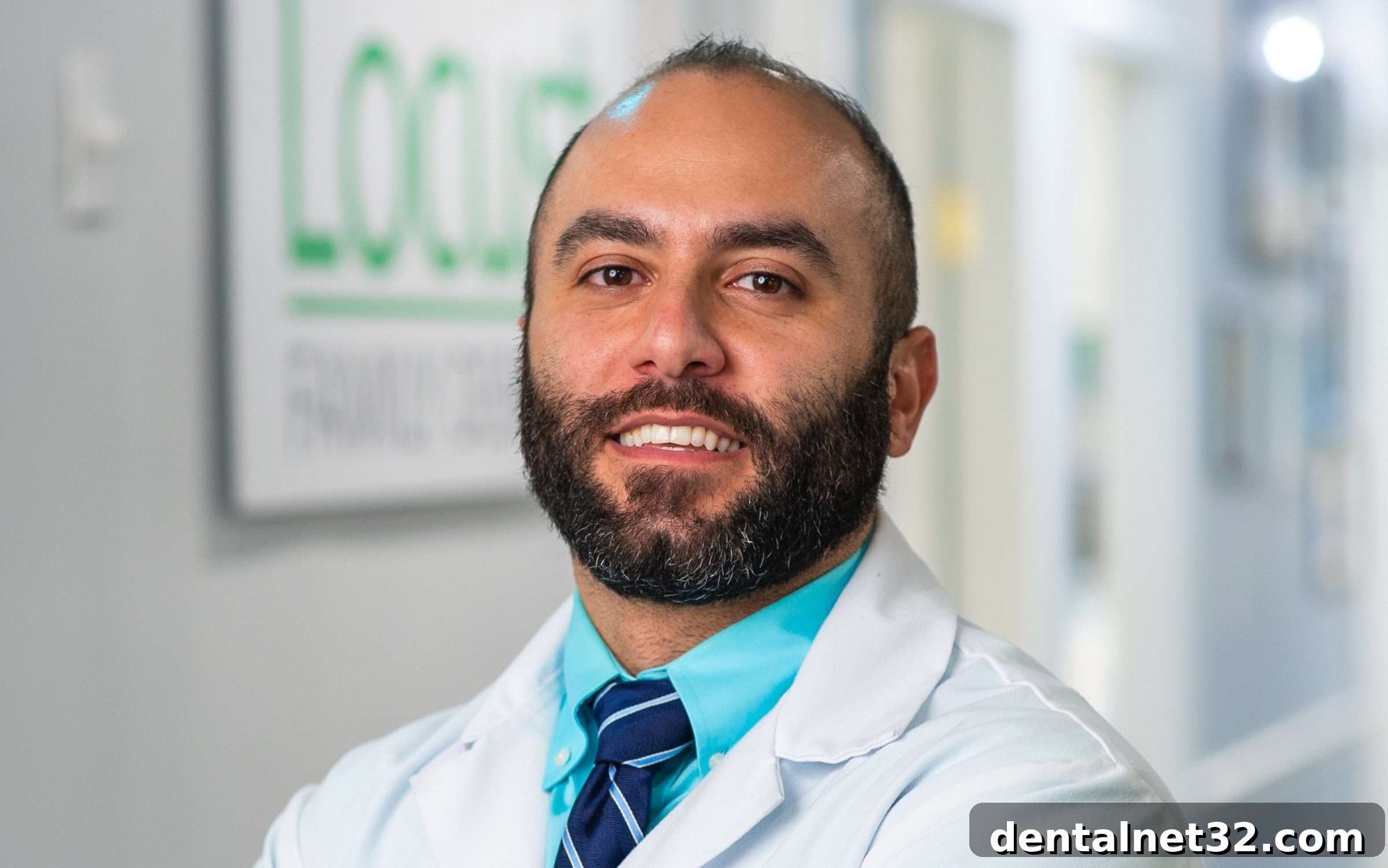 Dr. Wael Zeitouni consulting with a patient to improve oral health in Locust, NC