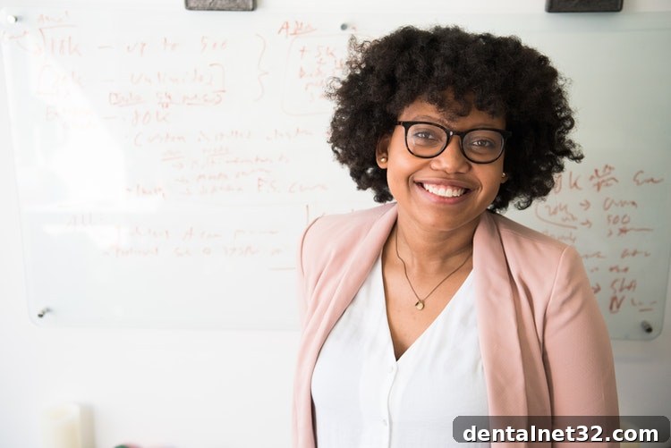 A smiling woman showcasing the results of cosmetic dentistry in Cary, NC