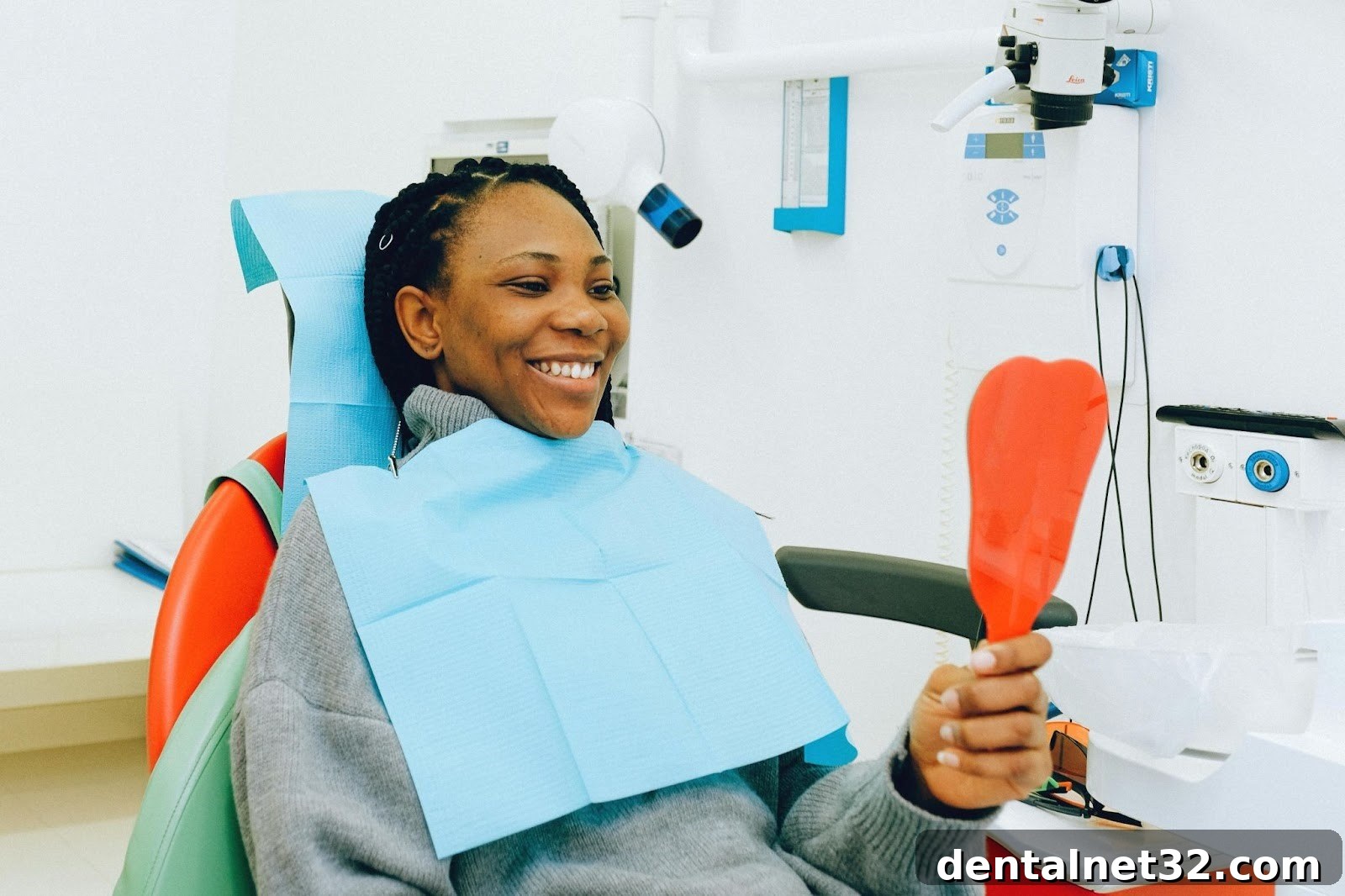 Your Healthiest Smile Without the Financial Headache 2 Smiling patient receiving affordable dental care from a dentist in Locust, NC