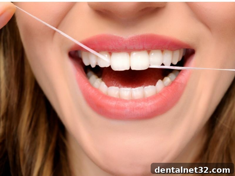 A diagram or illustration showing the correct C-shape flossing technique.