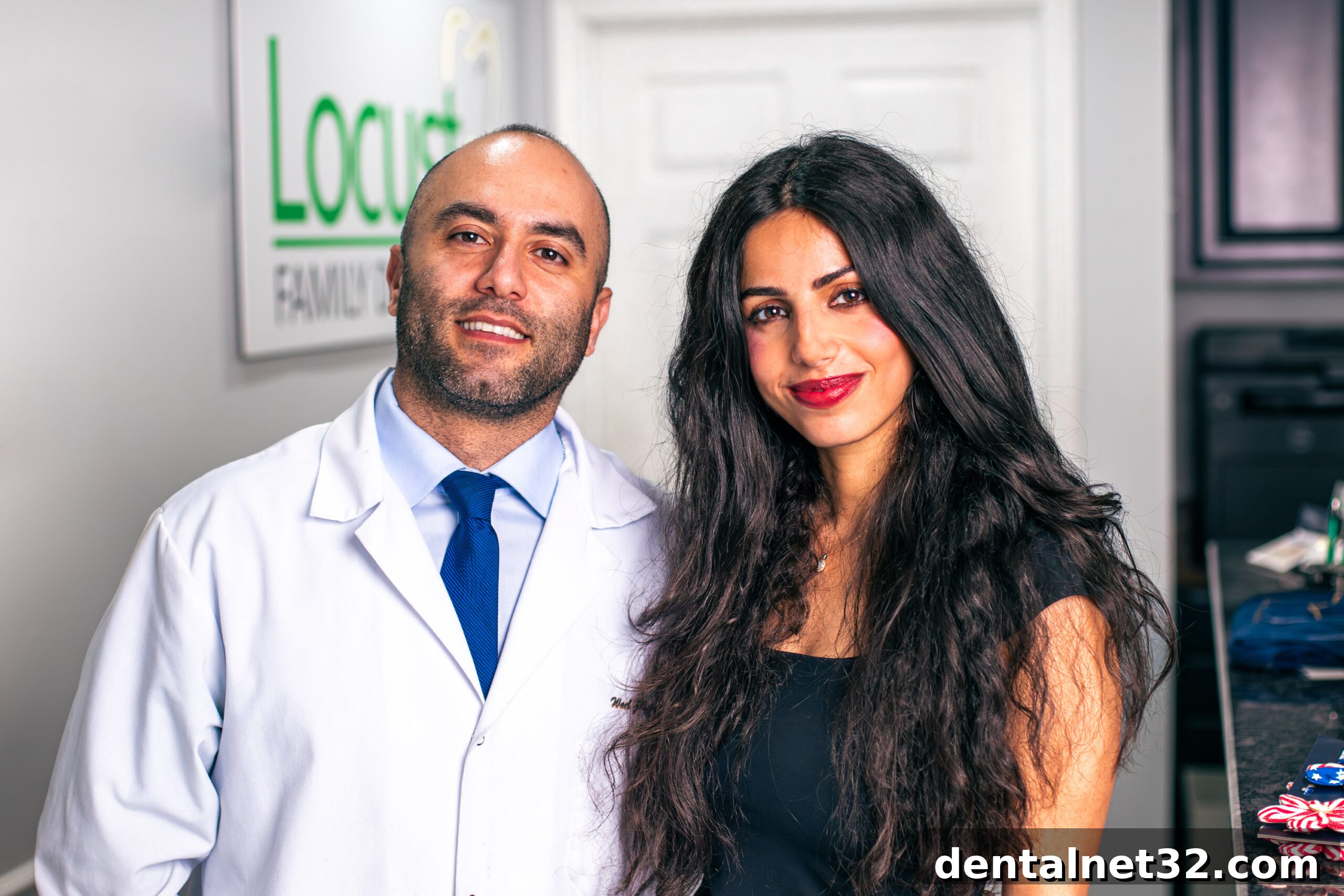 A friendly dental team consulting with a patient, helping them understand and maximize their dental insurance plan before the year ends.