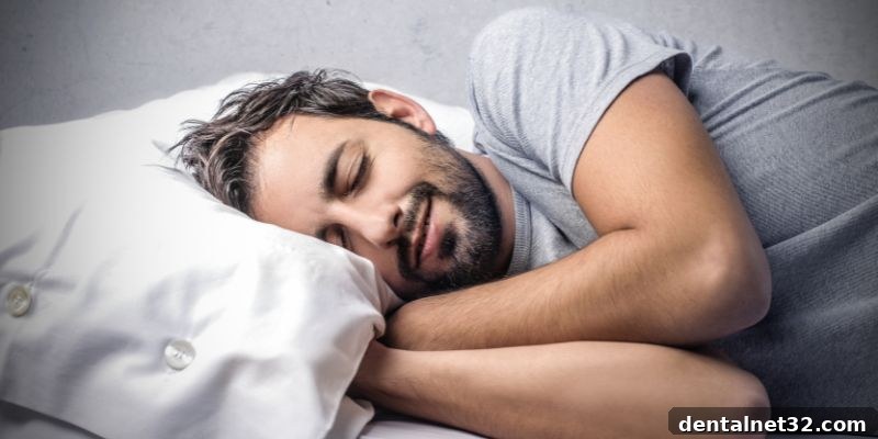 Mastering Your Night Guard for Peaceful Sleep 2 A person peacefully sleeping, successfully adjusted to their night guard for teeth grinding.
